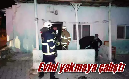 Evini yakmaya çalıştı