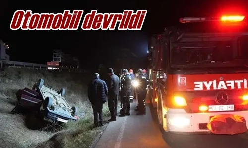 Otomobil devrildi