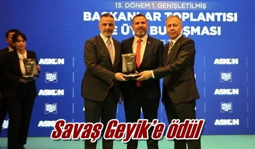 Savaş Geyik’e ödül