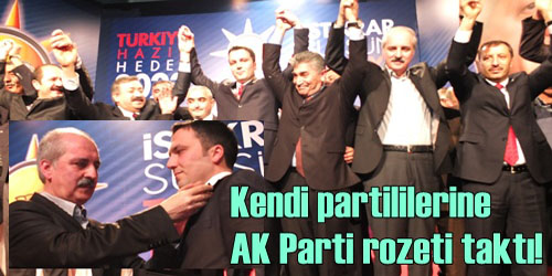 Kendi partililerine rozet taktı